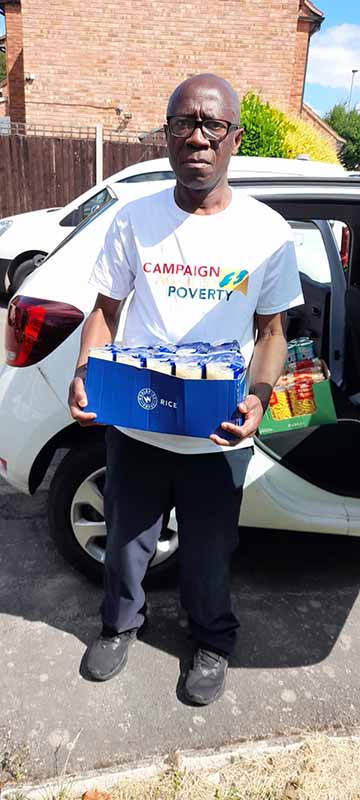 Robert Peprah Gyamfi donates food to Loughborough food bank on behalf of Campaign Against Poverty